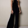 Black sleeveless velvet suit